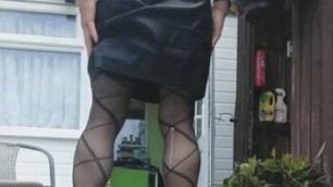 Tgirl in leather and stockings