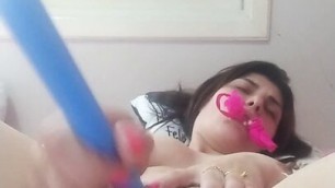 punching the toy in the tight pussy